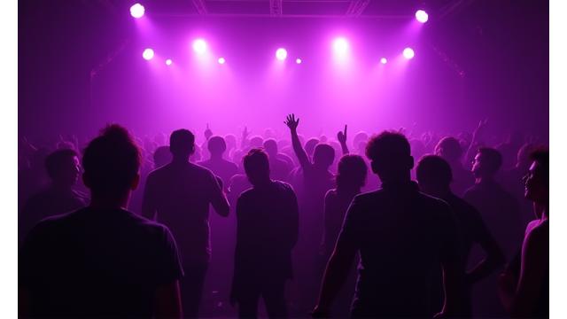 Vintage photo of an underground rave party with energetic crowd and basic lighting.